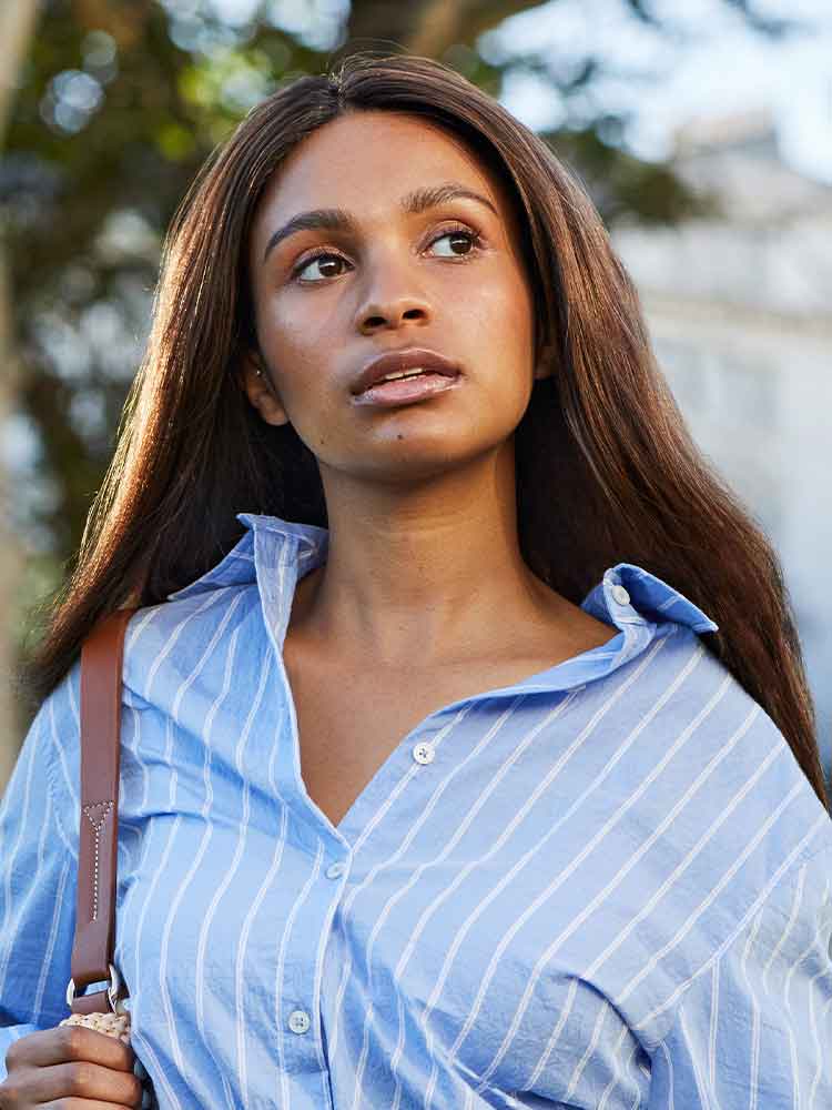 Front view of Amber human hair wig by Gem in brown, shoulder‑length Remy hair, lace front and monofilament top.