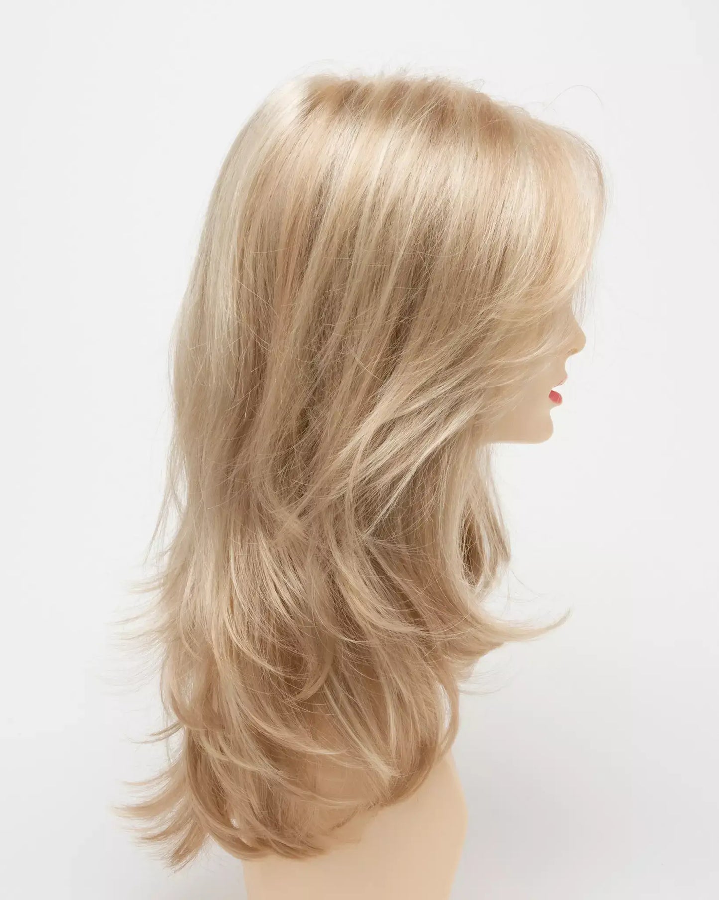Side view of Bobbi wig by Envy in Medium Blonde featuring a mono top and lace front for comfort and a natural appearance.
