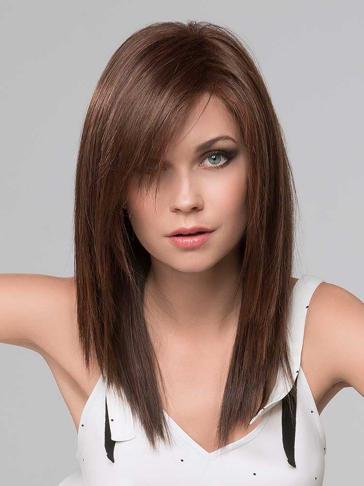 Code Mono Part wig by Ellen Wille from the Hairpower Collection – a long, layered synthetic wig with side-swept fringe and a mono part.