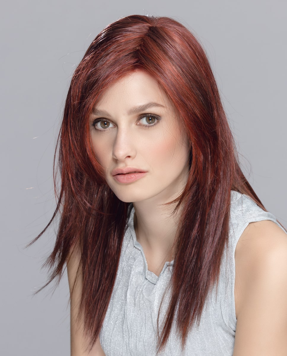 Code Mono Part wig by Ellen Wille from the Hairpower Collection – a long, layered synthetic wig with side-swept fringe and a mono part.