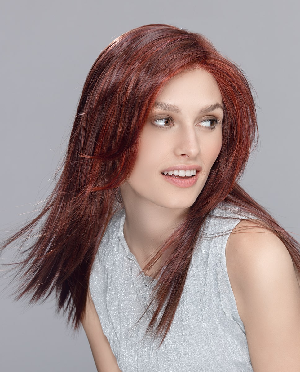 Code Mono Part wig by Ellen Wille from the Hairpower Collection – a long, layered synthetic wig with side-swept fringe and a mono part.