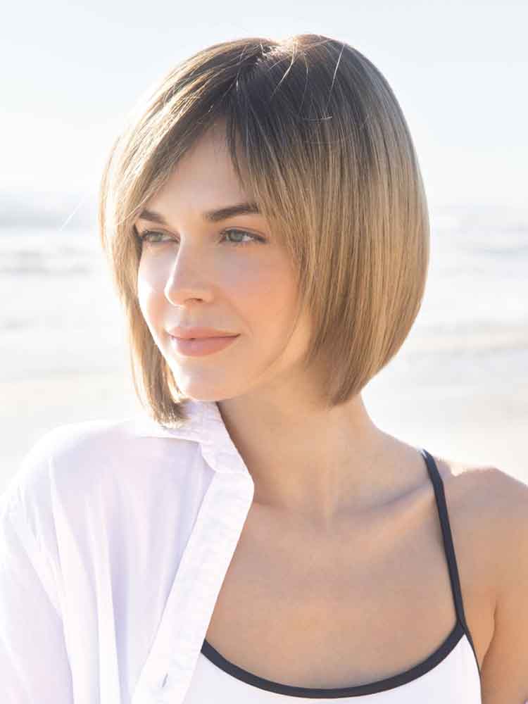 Side view Codi wig by Amore in Macadamia LR – angled bob with side swept fringe and monofilament top for a natural look