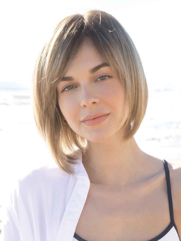 Codi wig by Amore in Macadamia LR – angled bob with side swept fringe and monofilament top for a natural look