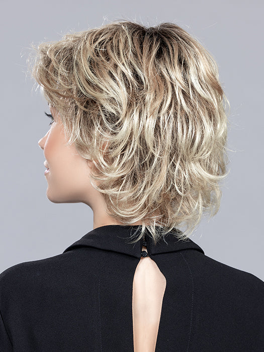 Back view of Daily Mono wig by Ellen Wille Hairpower Collection in Champagne Rooted, a timeless style with subtle loose curls.
