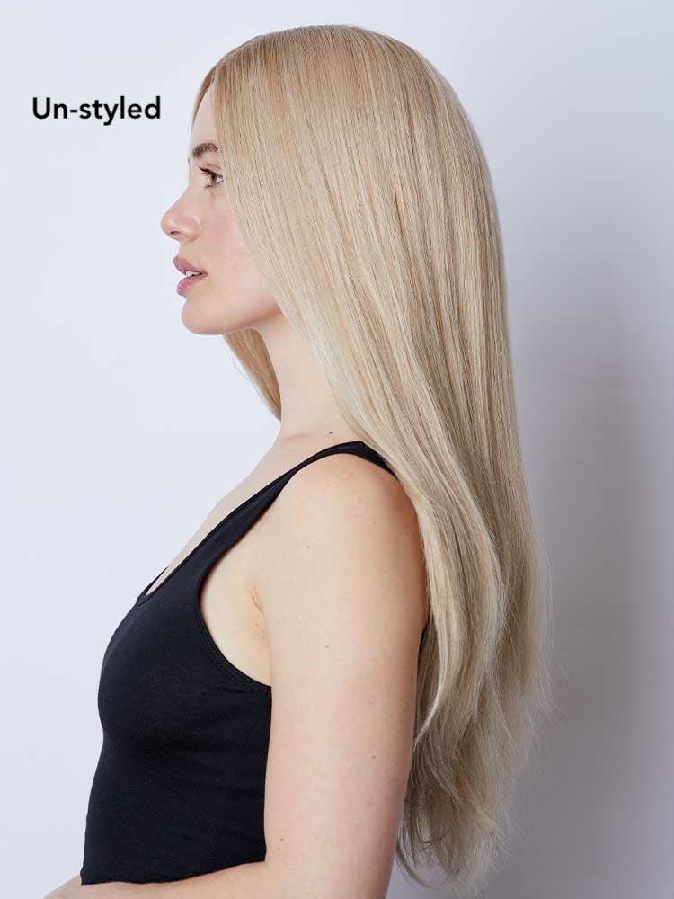 Side view of Diamond human hair wig by Gem in blonde, long-length Remy hair, lace front and monofilament top.