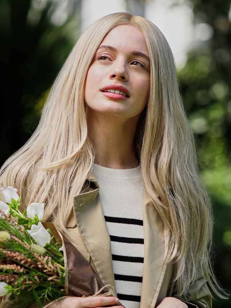 Front view of Diamond human hair wig by Gem in Champagne, long-length Remy hair, lace front and monofilament top.