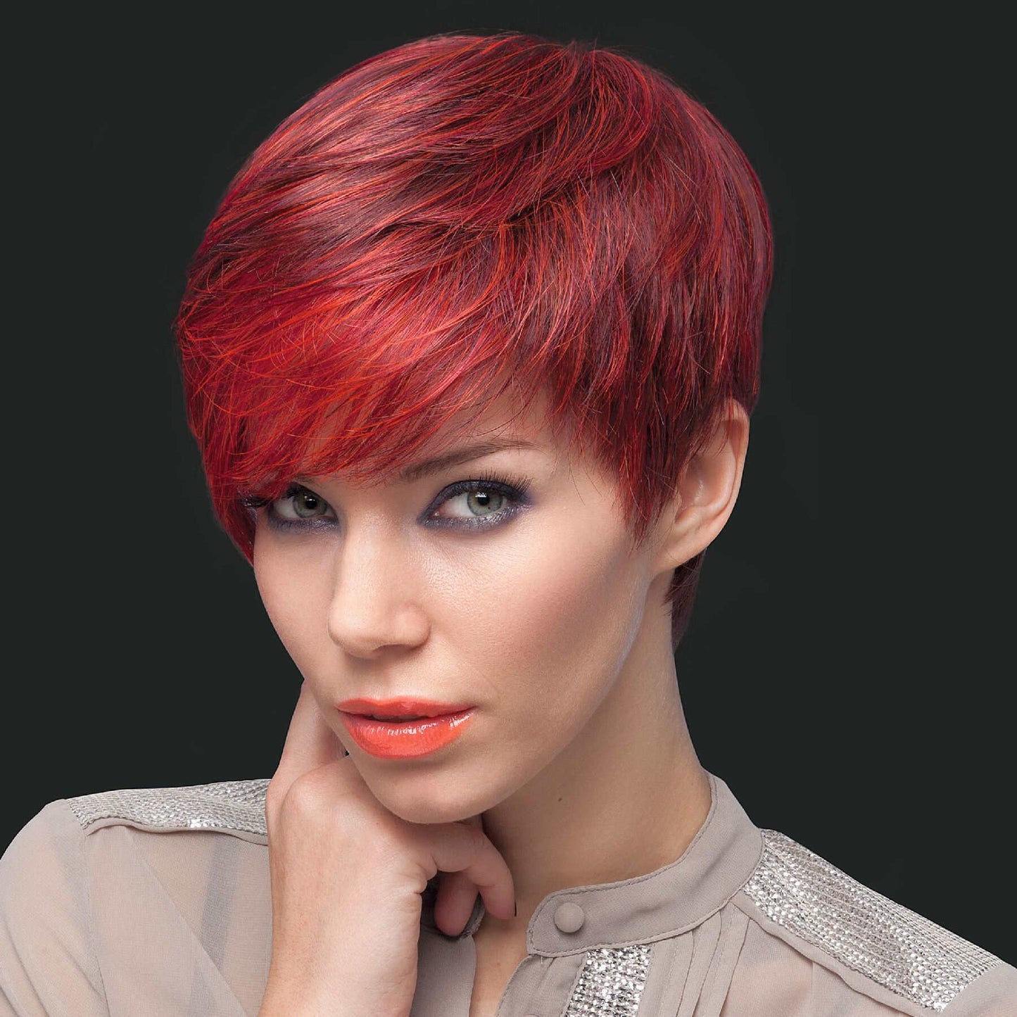 Front view of the Point wig from Ellen Wille Perucci Collection, asymmetrical bob in Hot Flame Mix.