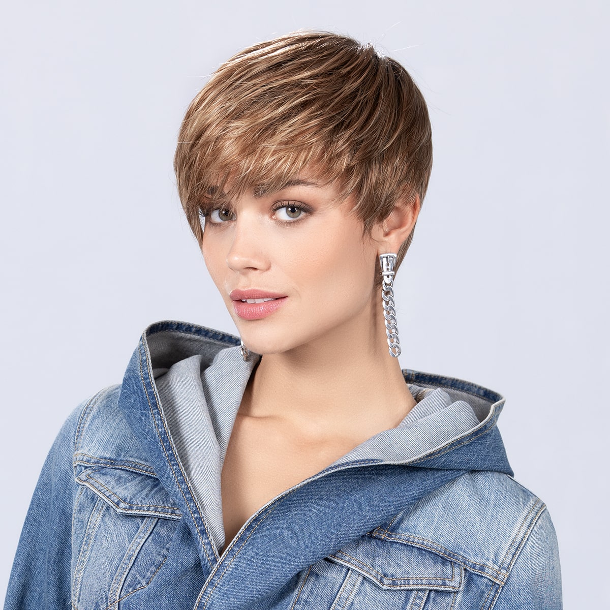 Front view of the Point wig from Ellen Wille Perucci Collection, asymmetrical bob in Light Bernstein Rooted.