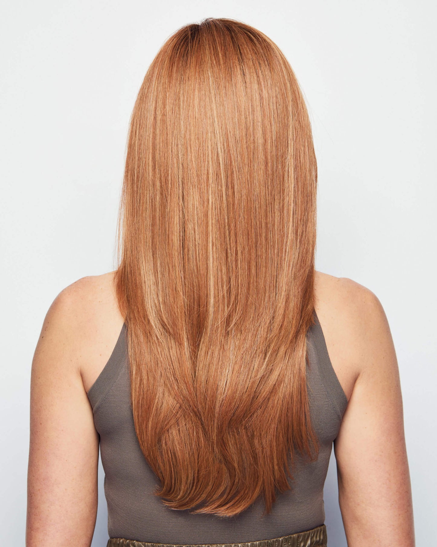 Back view of Scene Stealer wig by Raquel Welch - layered style with lace front, mono top and heat-friendly.