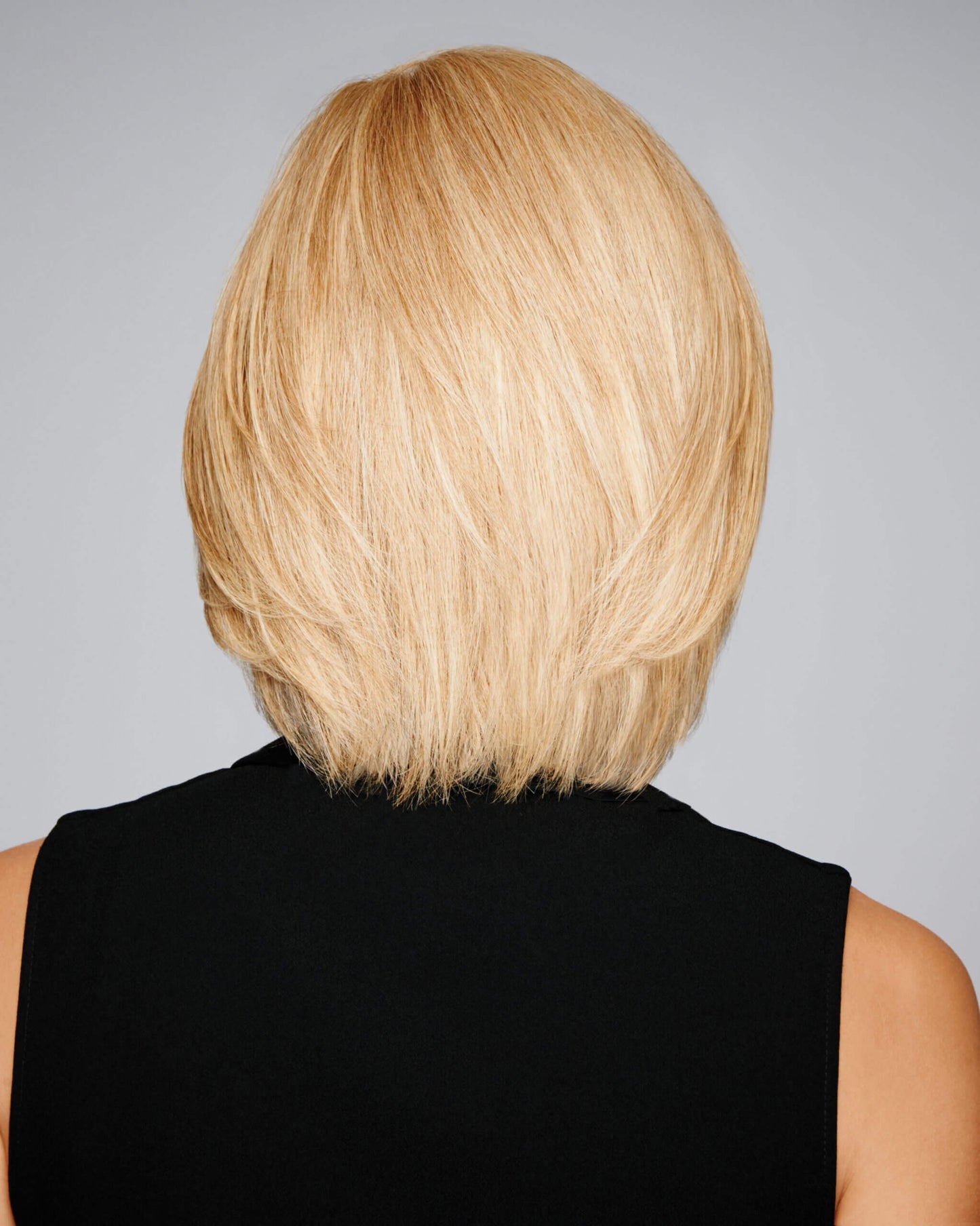Back view of Soft Focus wig by Raquel Welch – chin-length bob made with 100% human hair for natural look and everyday wear.