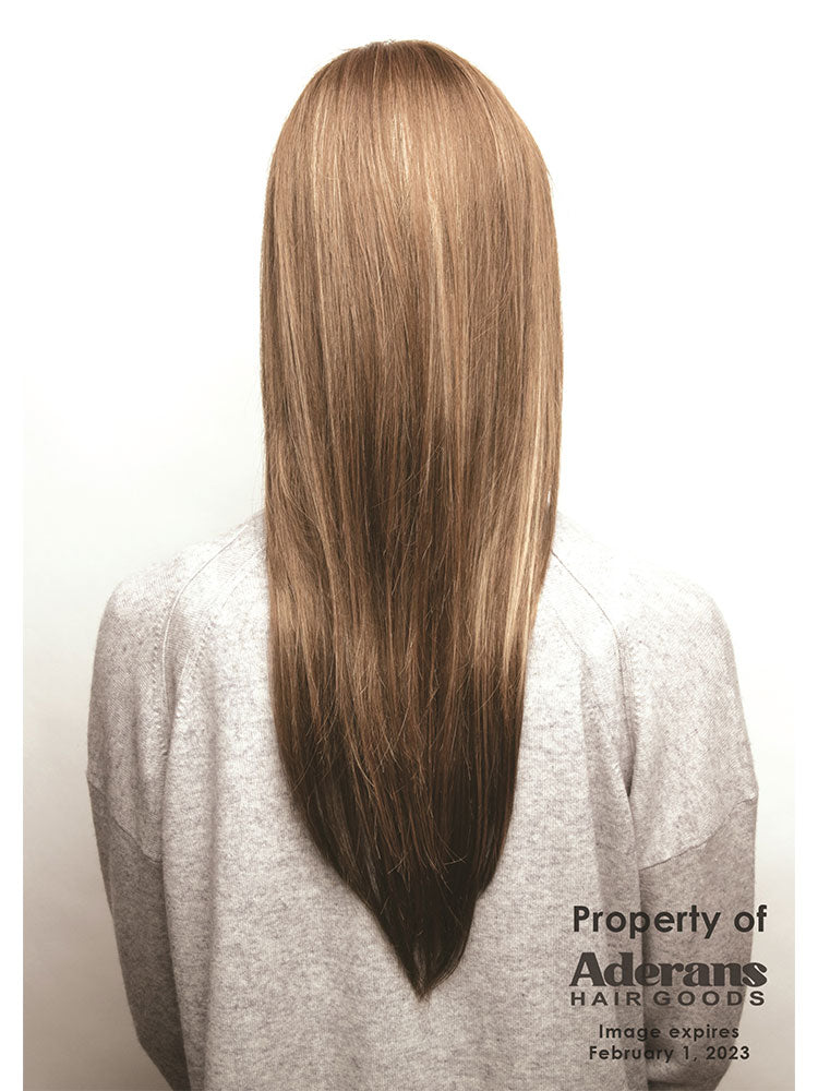 The Stevie wig by Amore in colour Honey Wheat has long flowing layers and monofilament top cap.