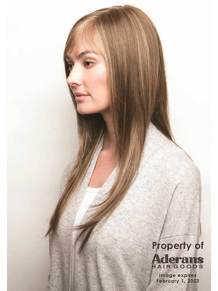 The Stevie wig by Amore in colour Honey Wheat has long flowing layers and monofilament top cap.