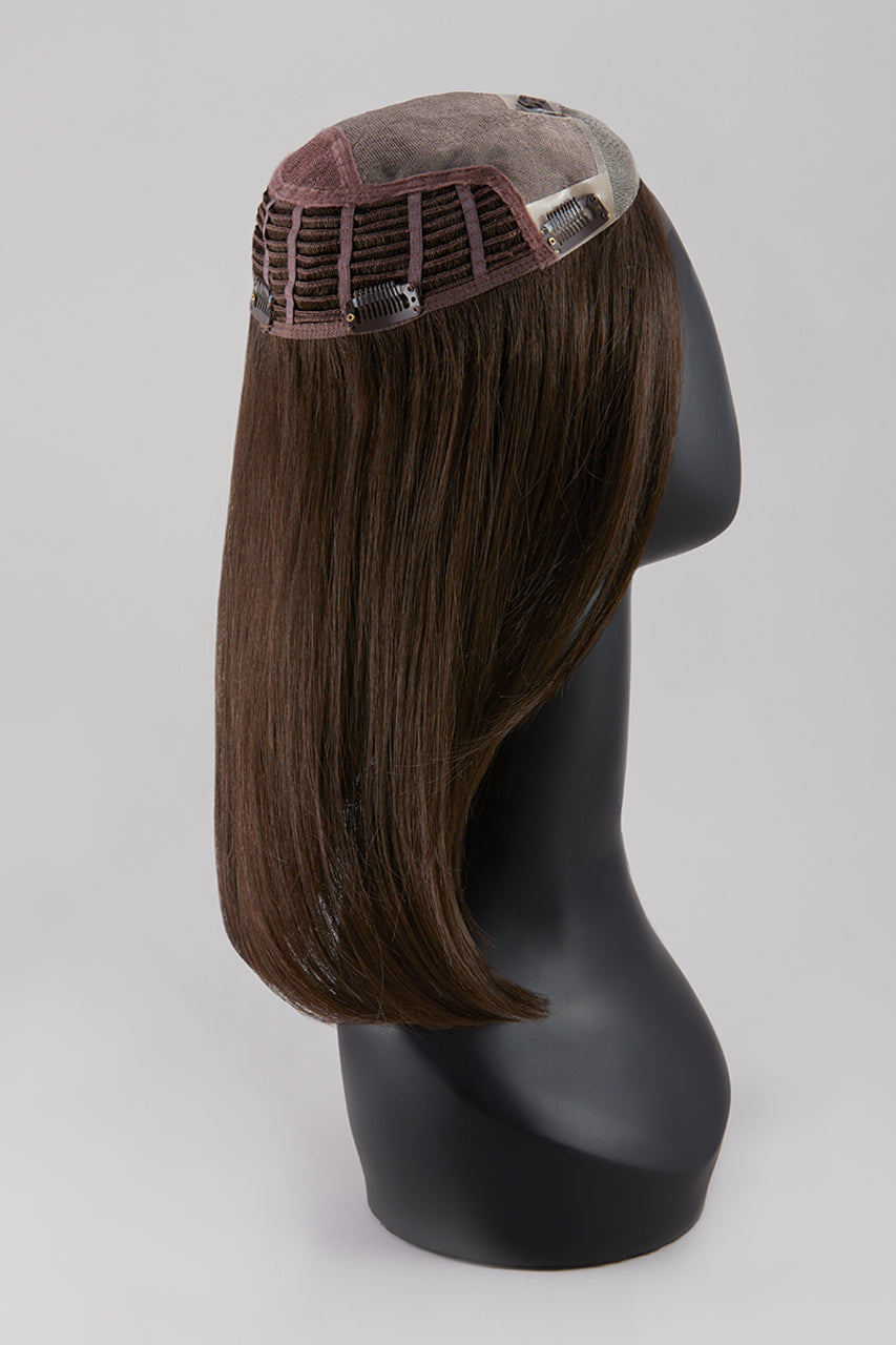 The Top Smart 12" Enhancer by Jon Renau blends SmartLace™ lace front with the lightweight comfort of a crown topper.