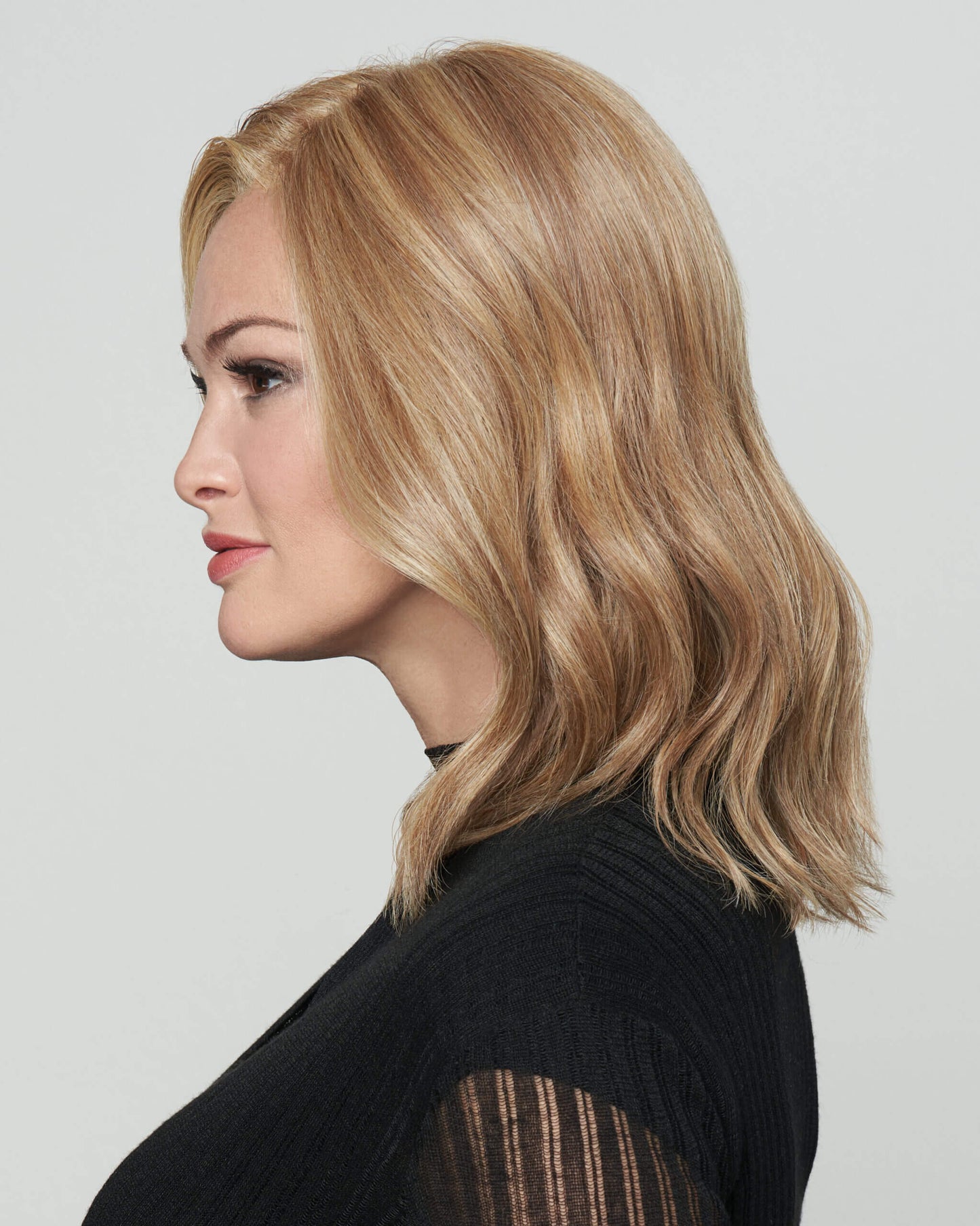 Alt Side view of Wavy Day wig by Raquel Welch – soft, shoulder-length waves with lace front and mono top for a natural look.