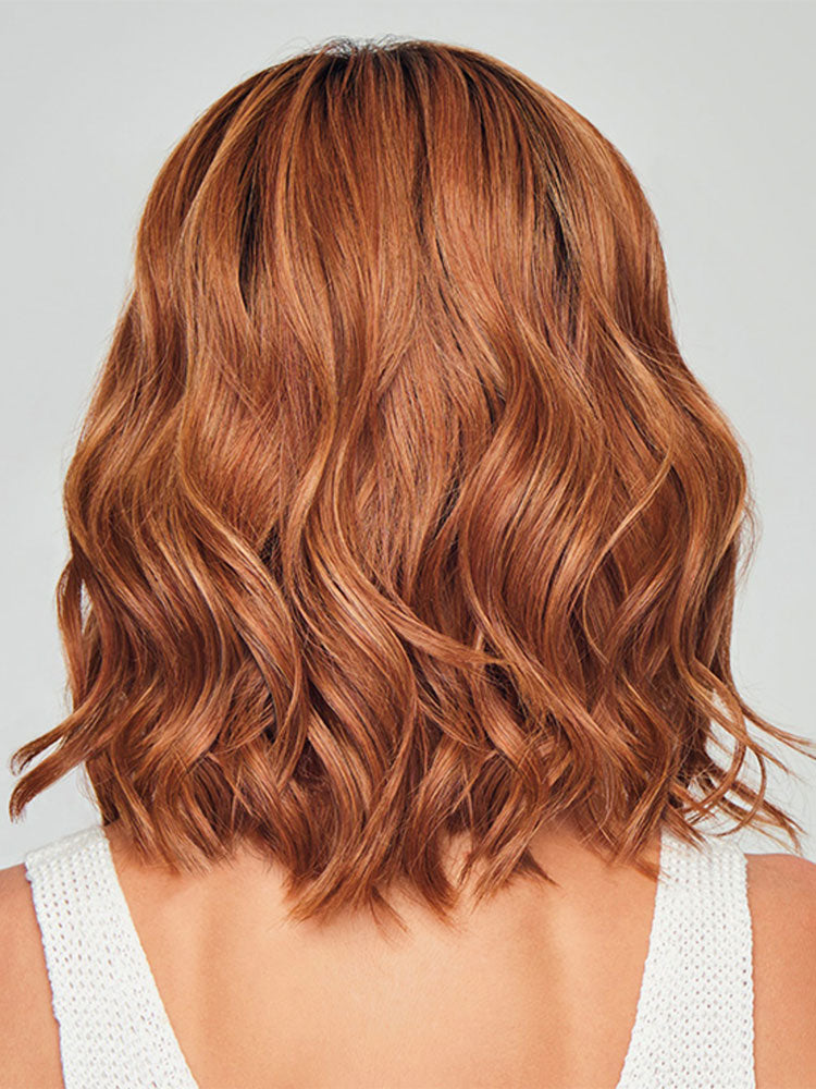 Back view of Simmer Elite wig by Raquel Welch - shoulder-length waves with lace front, mono top and heat-friendly fibre.