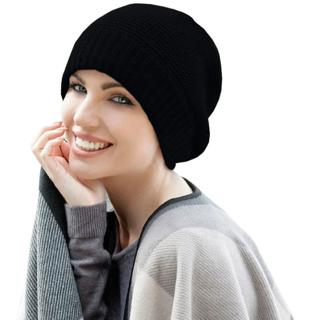 Ari Hat by Masumi is a winter beanie with soft fleece lining, full coverage in colour black.