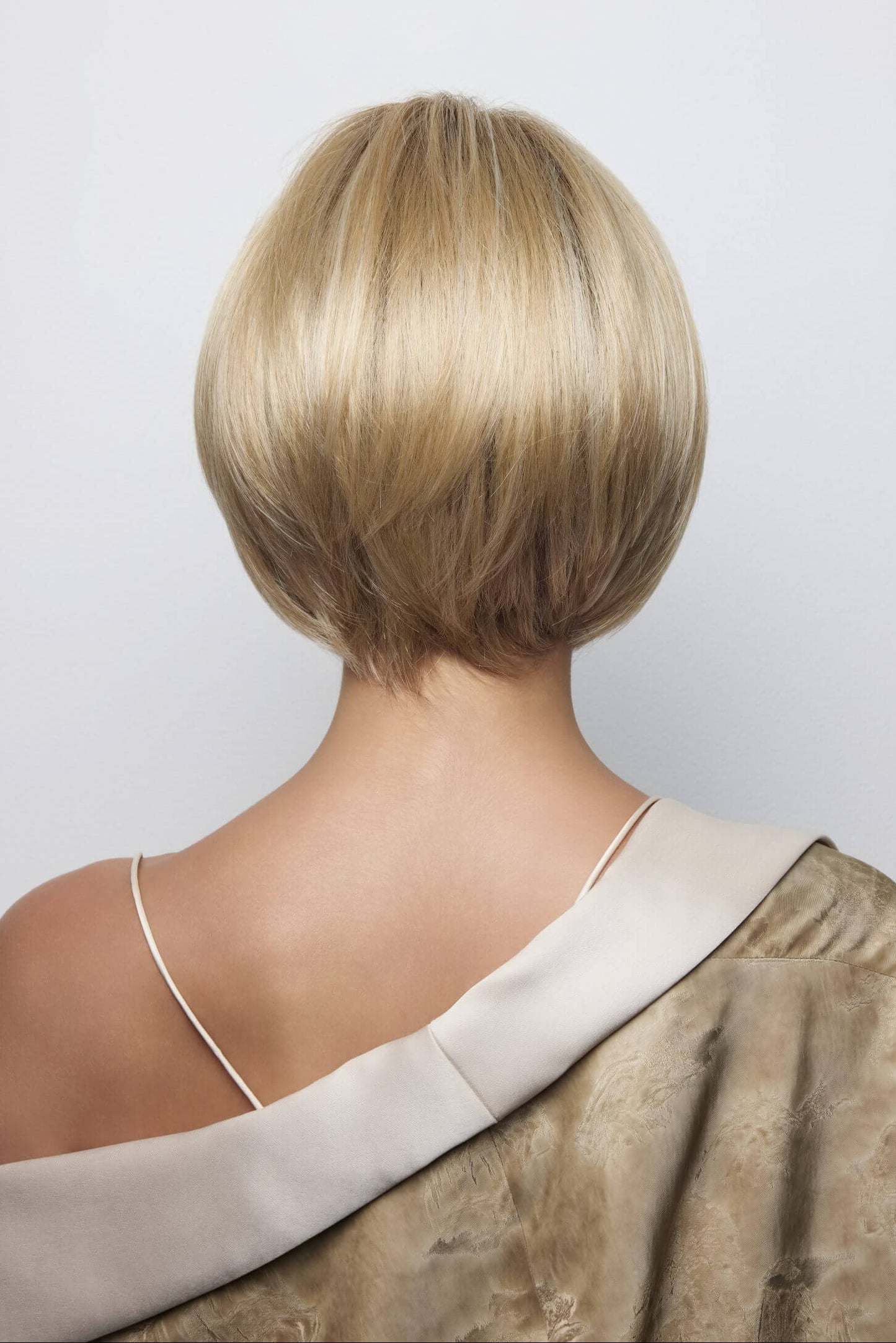 Ayumi wig by Noriko, chin-length straight bob in Sandy Blonde Cream-R back view.