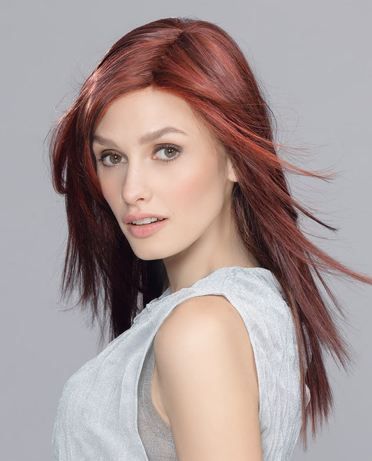 Code Mono Part wig by Ellen Wille from the Hairpower Collection – a long, layered synthetic wig with side-swept fringe and a mono part.
