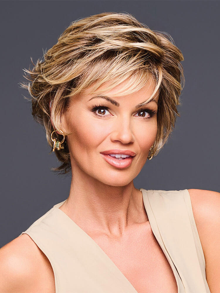 Front view: Edge Factor Gabor wig, short layered synthetic style, wispy front, SS Cappuccino, modern everyday look.
