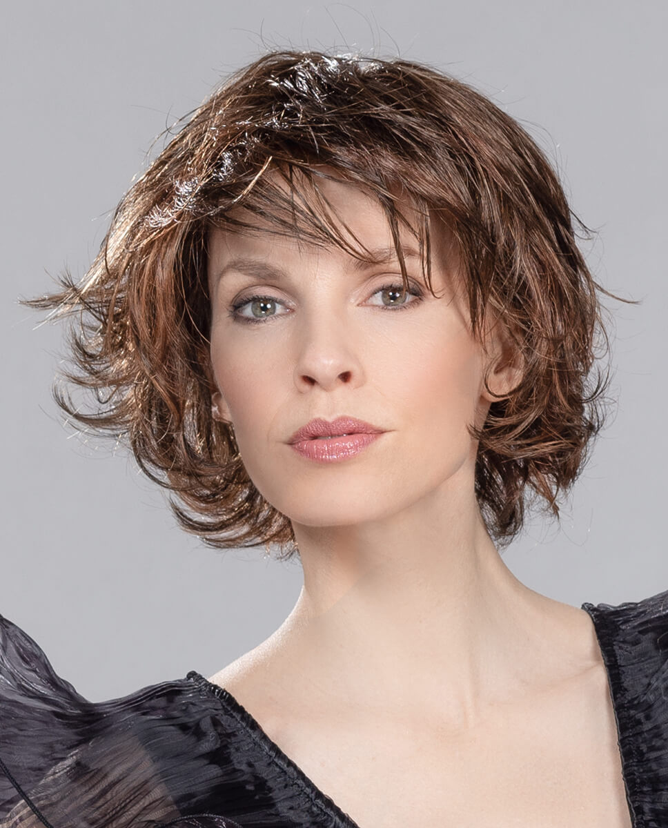 Front view of Flair Mono wig by Ellen Wille in Chocolate Mix, short flicked style with mono top and extended lace front.