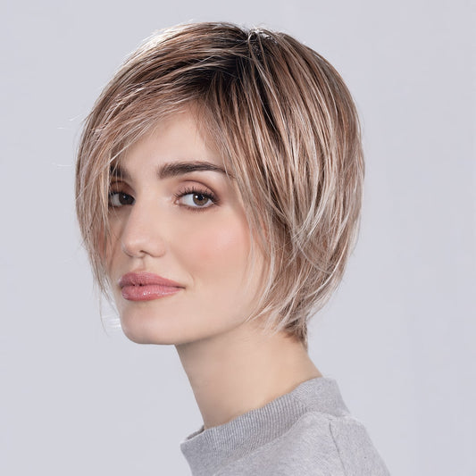 Front view of Echo Wig by Ellen Wille – long, layered synthetic wig with soft waves in Sand Multi Rooted.