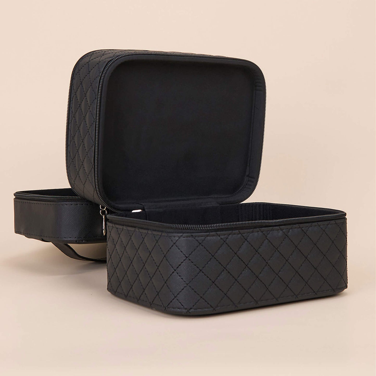 Jon Renau Travel Case - Compact design with a handy carrying handle. 