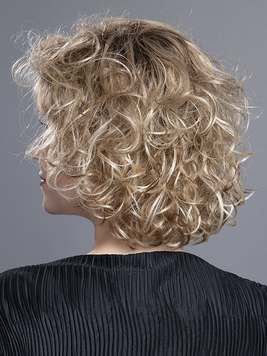 Back view of Loop wig by Ellen Wille – a curly, synthetic style from the Changes Collection. Colour Sandy Blonde Rooted.