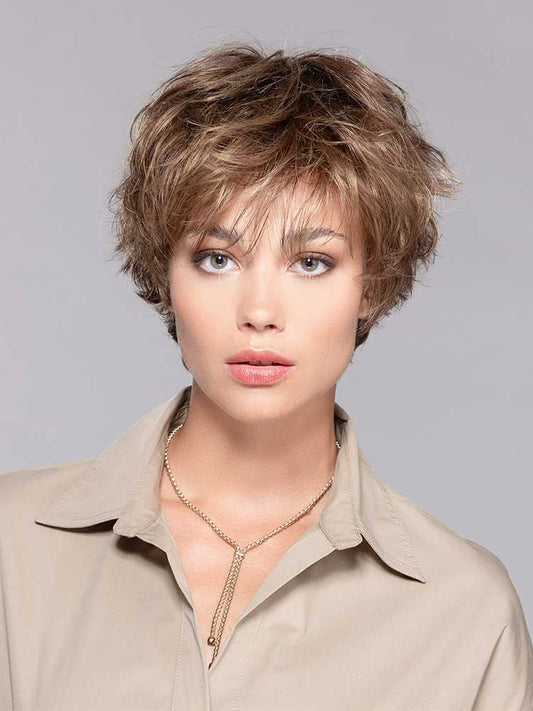 Lugano wig by Ellen Wille in Hot Mocca Mix, short wavy synthetic style with monofilament crown for natural-looking volume.