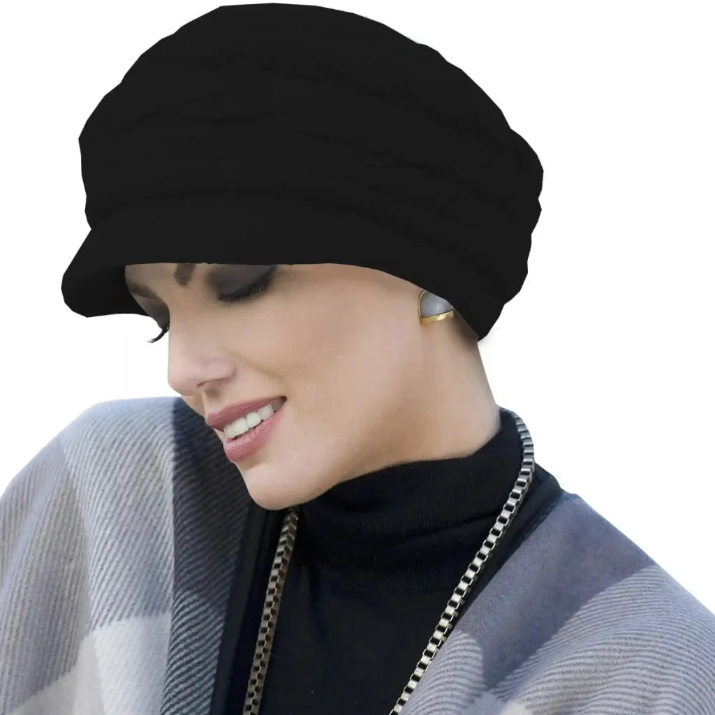 Michelle Knitted Hat by Masumi is a soft, stylish winter hat in colour black and elegant plaited design.