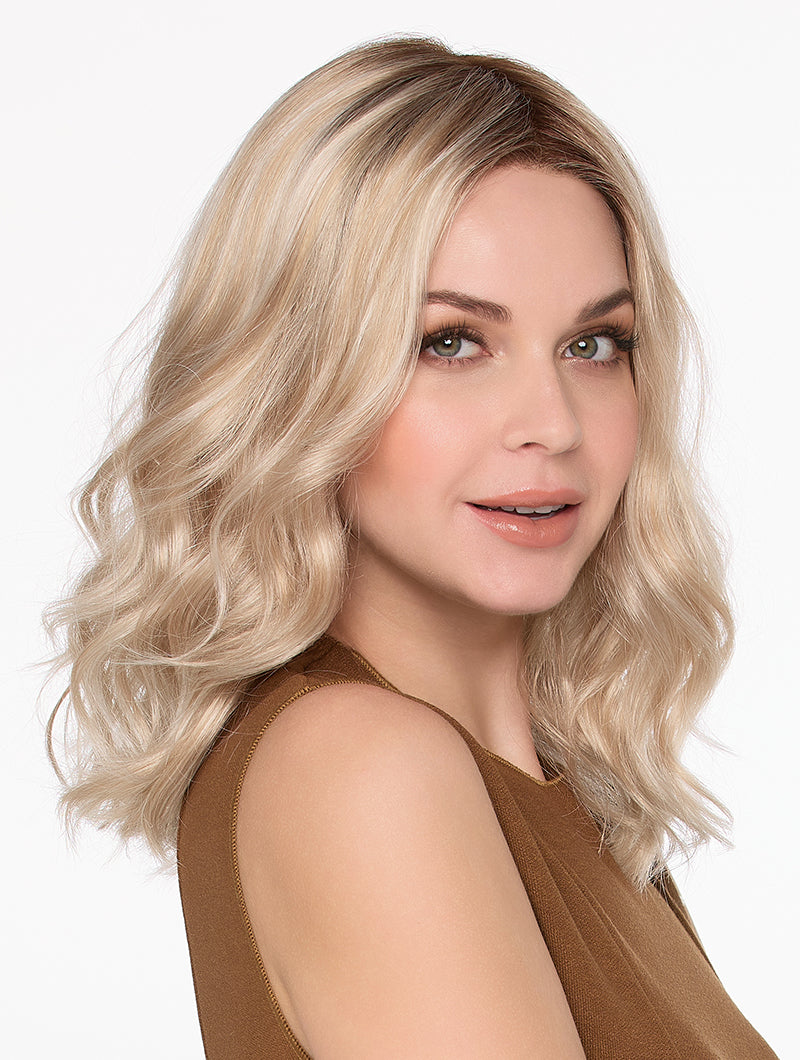 Side view Molly wig by Envy with blonde rooted waves with lace front and mono top