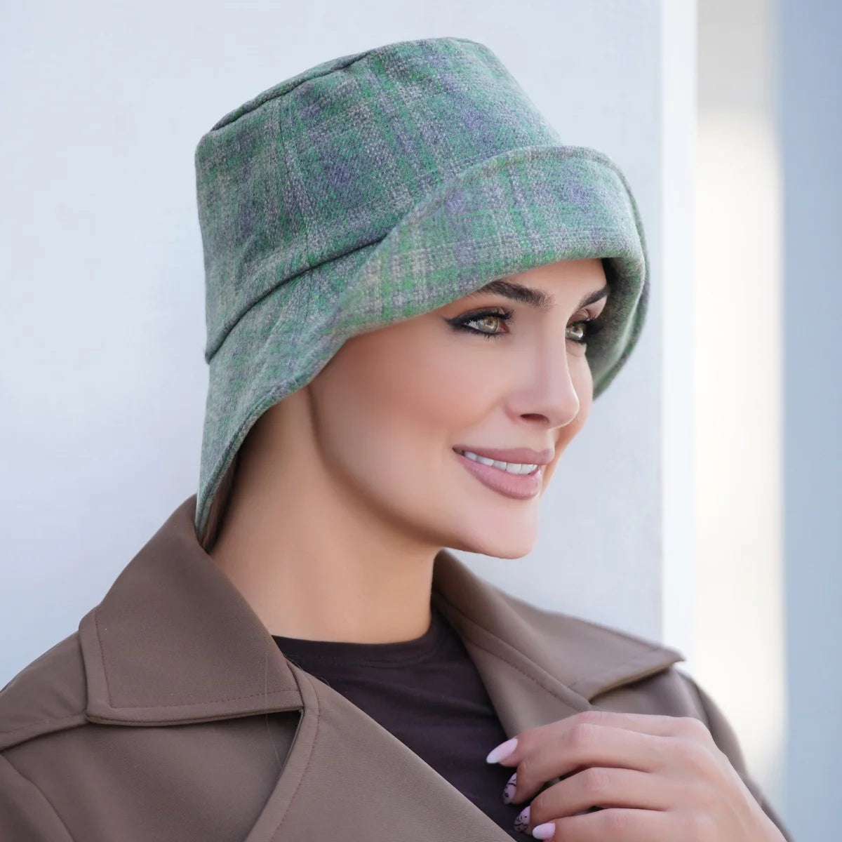 Olivia Hat by Masumi features soft bamboo lining and wool exterior in colour Tartan Green.