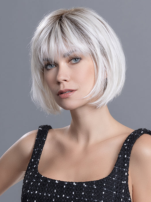 Front profile of Sing Mono Part wig by Ellen Wille - a bob style shown in colour Pastel Blonde Rooted.