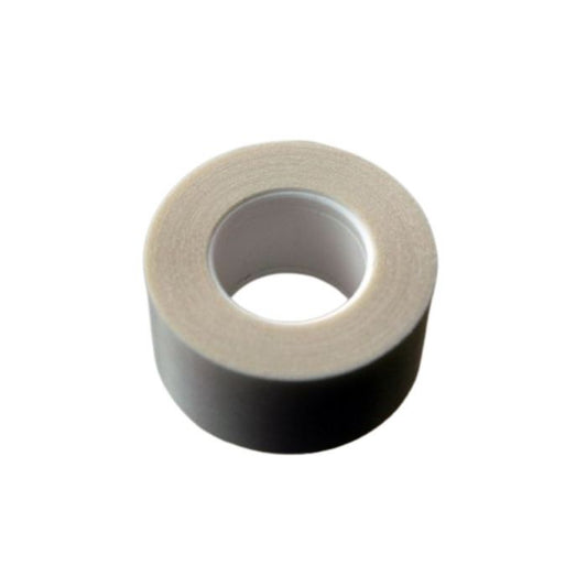 A roll of double-sided wig tape in beige colour.