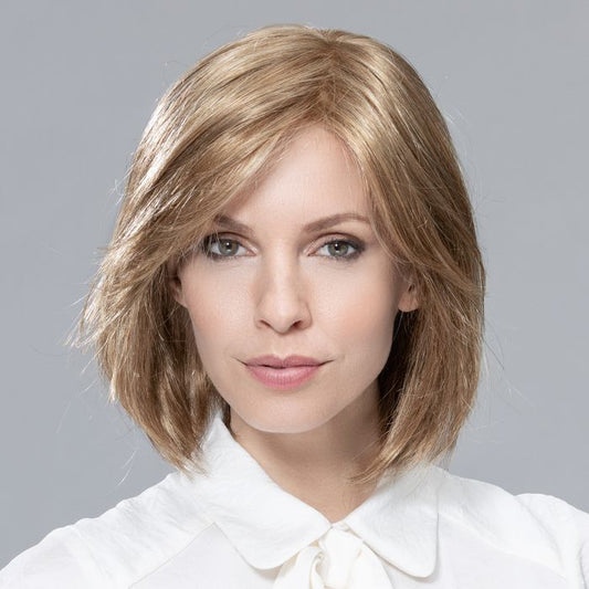 Tempo 100 Deluxe Large wig by Ellen Wille is a classic bob style with a long sweeping fringe and textured layers.