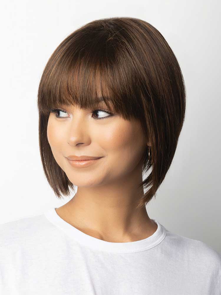 Side view of René of Paris Tori wig – angled bob with blunt fringe, synthetic fibre in Toasted Brown.