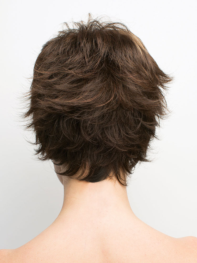 Back view of Tova wig by Amore in Coffee Latte – short, textured pixie cut with wispy layers and double mono top.
