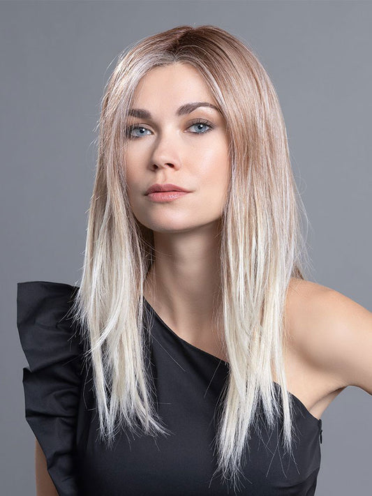 Diva Mono Part wig by Ellen Wille features soft, shoulder-length layers and heat-friendly fibre for styling flexibility. Shown in Candy Blonde Rooted.
