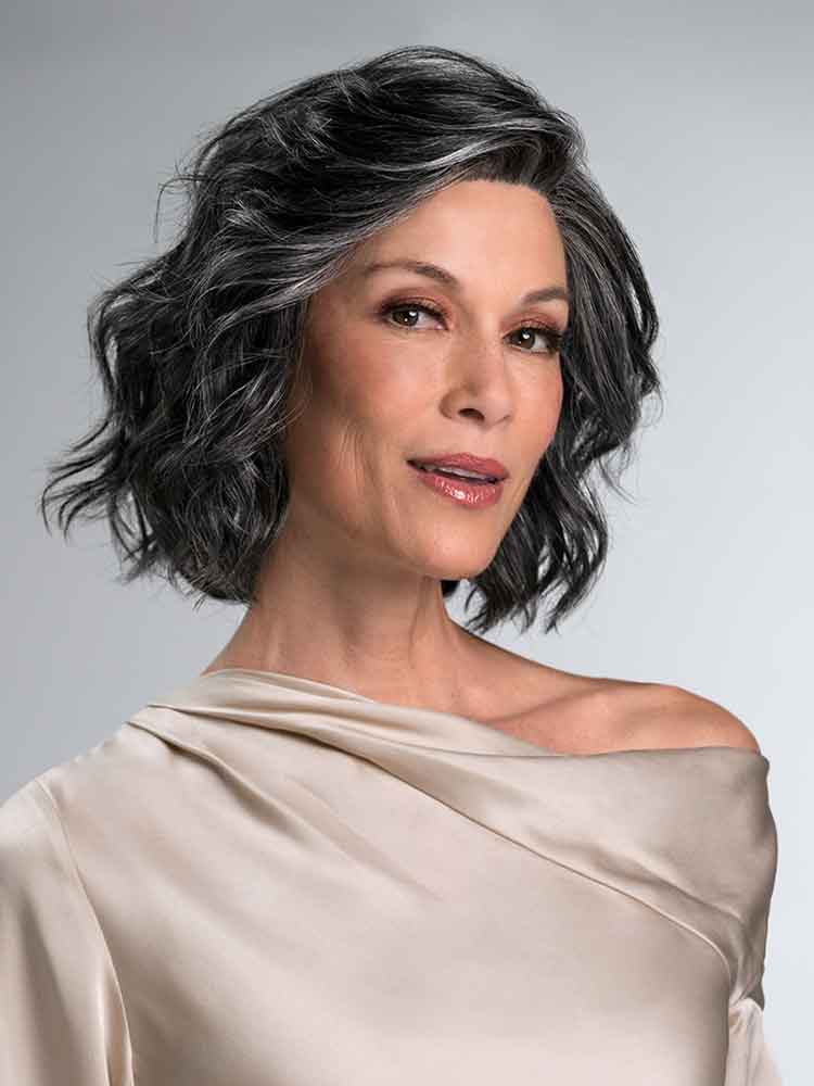 January wig by Jon Renau has short, textured waves and a monofilament top for multidirectional parting. Features an ultra-light wefted back from the SmartLace™ Collection.